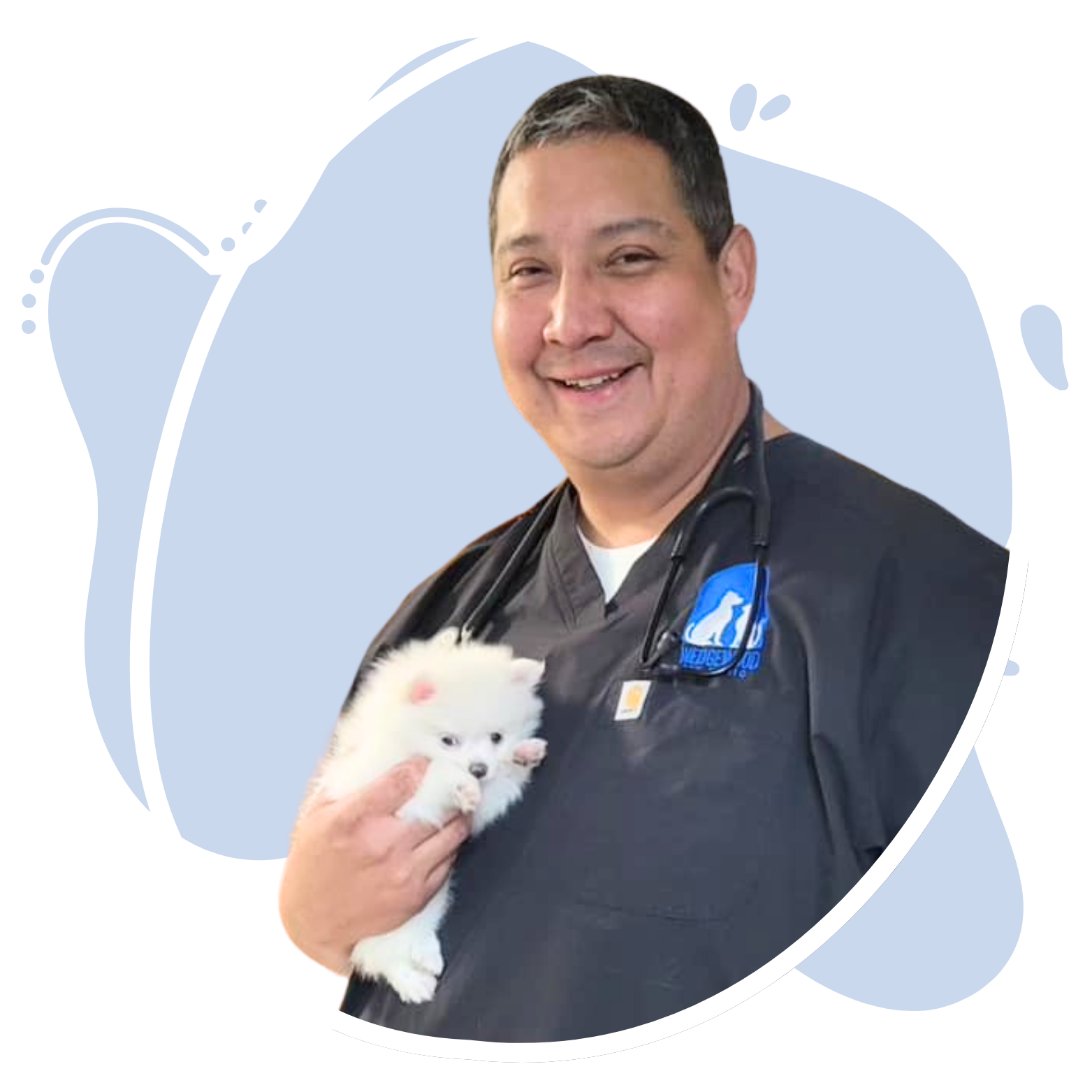 Dr. Little Jim holding a small dog.